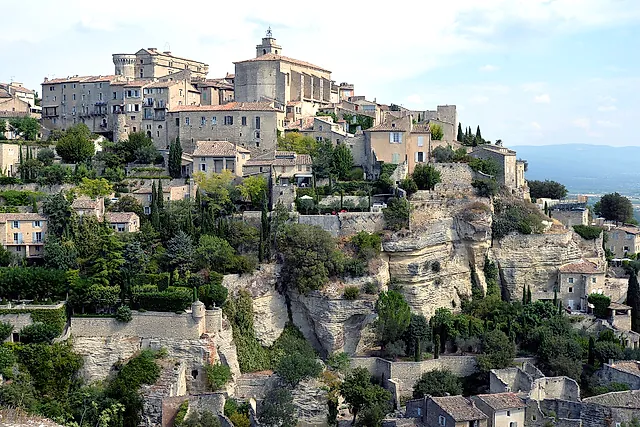 The hilltop village of Gordes in the Luberon, with its church and castle above steep rock