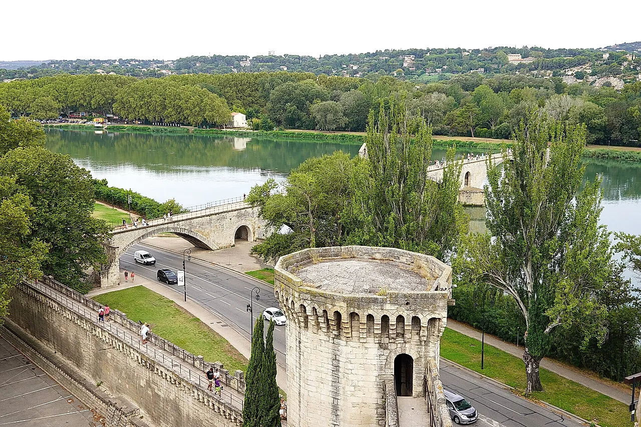 The Rhône and the Pont d'Avignon seen from the city walls, with a round tower in the foreground