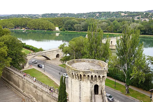The Rhône and the Pont d'Avignon seen from the city walls, with a round tower in the foreground